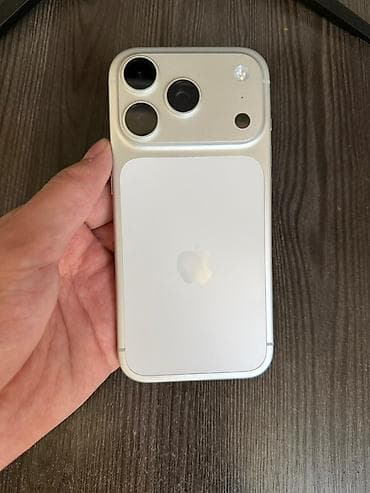 a 11: IPhone 17 Pro, Б/у, 256 ГБ, Серебристый, Зарядное устройство, Защитное стекло, Чехол, 100 % — 2