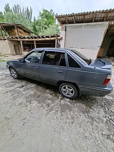 адисей обсалют: Daewoo Nexia: 1996 г., Седан — 5