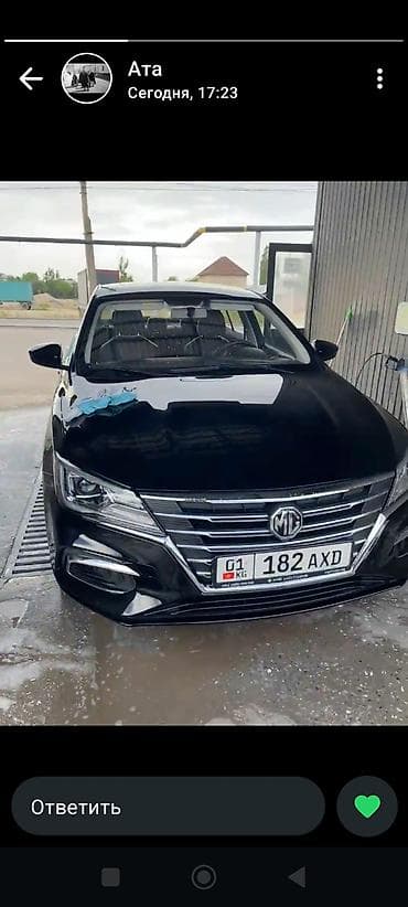 MG: MG (Morris Garages) седан, черный цвет. Ключевые особенности: - — 1