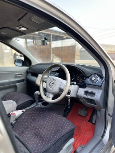 обмен дом на авто: Mazda Verisa: 2003 г., 1.3 л, Автомат, Бензиновая, Хэтчбэк — 6