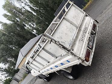 Hyundai Porter: 1997 г., 2.5 л, Механика, Дизель, Бус — 3
