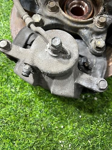 tucson: Передний левый суппорт Hyundai 2016 г., Оригинал — 1