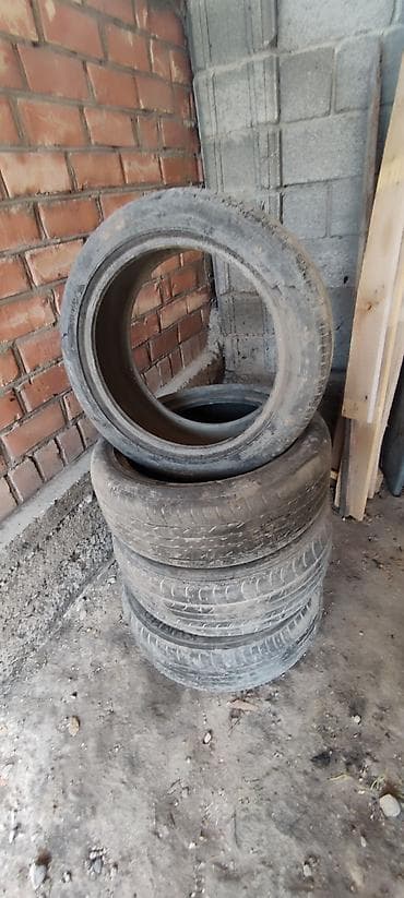 50: Всесезонные шины R17 215/50, комплект 4 шт. Состав: - 2× Dunlop - 1× — 1