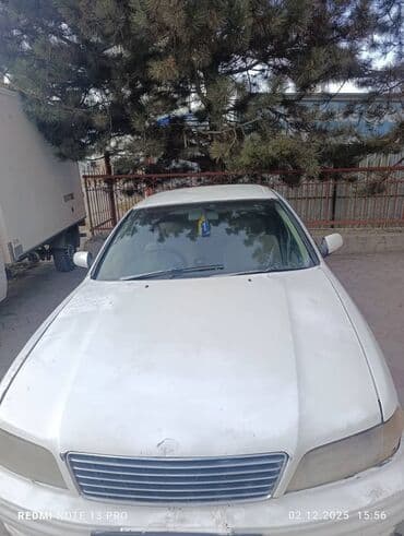 продаю авто в рассрочку без банк: Легковой седан белого цвета с правым рулем. Кузов: - 4 двери — 9