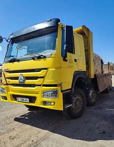 Самосвал Howo (CNHTC) 371, желтый. - Колесная формула 6x4. - Мощность