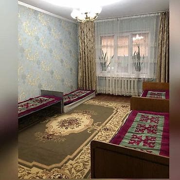 Комната с несколькими спальными местами в квартире. - Просторная