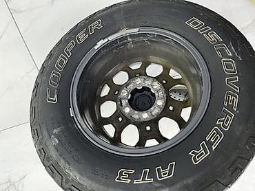 265: Комплект из 4 колес Toyota TRD с внедорожными шинами Cooper Discoverer — 1