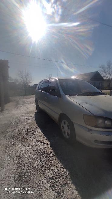 авто зонтик: Продаётся компактный праворульный минивэн/универсал серебристого — 1