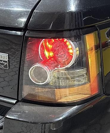 Стоп-сигналы: Комплект стоп-сигналов Land Rover Оригинал — 1