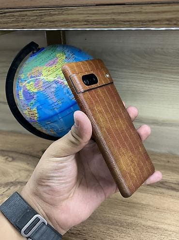 Google Pixel 7, Б/у, 128 ГБ, цвет - Черный, 1 SIM, eSIM — 2