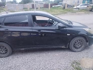 арзан машине: Hyundai Solaris: 2011 г., 1.4 л, Кол менен иштөөчү, Бензин, Хетчбек — 3