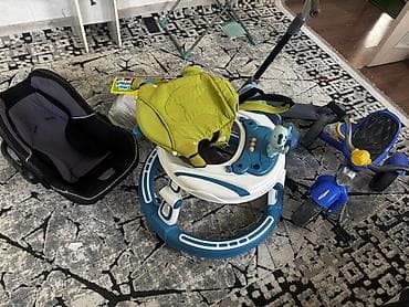 Детский набор вещей и транспорта В комплекте: - Ходунки для малышей