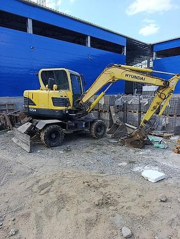 долбим бетон: Экскаватор, Hyundai, Колесный — 2