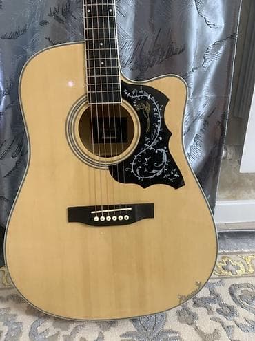 Гитары: Электроакустическая гитара формата дредноут с вырезом. Характеристики — 4