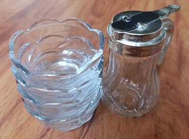 стеклянные посуды: Набор стеклянной посуды включает четыре небольшие пиалы или вазочки и — 1
