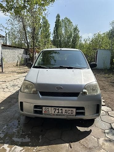 мотоцыкл хонда: Daihatsu Cuore: 2003 г., 1 л, Механика, Бензин, Хэтчбэк — 1