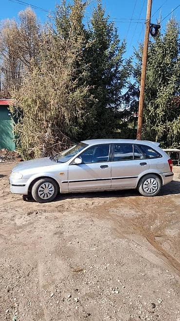 мазда 621: Mazda 323: 1999 г., Автомат, Универсал — 5