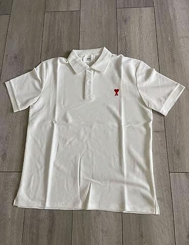 Футболки: Белое поло с коротким рукавом и отложным воротником. Застёжка на — 1