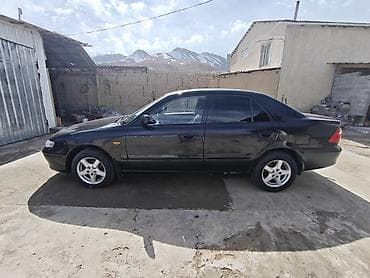 насадка для глушитель: Mazda 626: 2000 г., Седан — 5