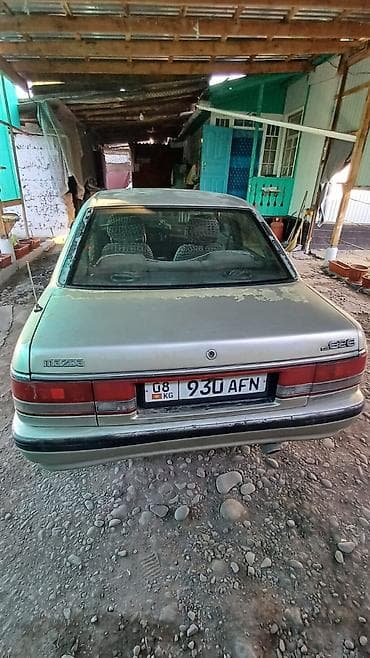 чанган уни к: Mazda 626: 1990 г., 2 л, Кол менен иштөөчү, Бензин, Седан — 4