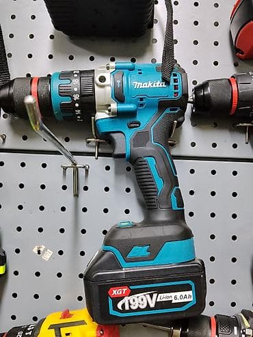 ac adapter: Аккумуляторная ударная дрель-шуруповёрт Makita (серия XGT) - Тип — 1