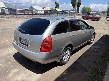 каракол авто: Nissan Primera: 2001 г., 2 л, Автомат, Бензин, Универсал — 5