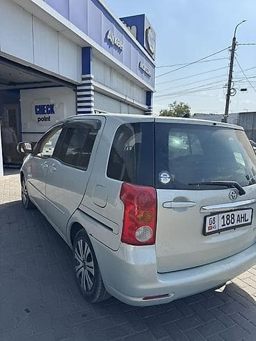 тайота из: Toyota Raum: 2003 г., 1.5 л, Автомат, Бензин, Минивэн — 5
