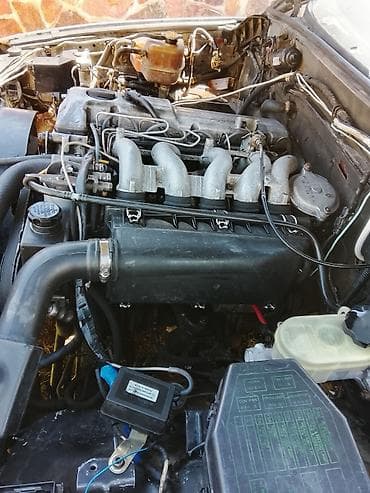 купить mitsubishi pajero mini: Ssangyong Musso: 1995 г., 2.9 л, Механика, Дизель, Внедорожник — 10