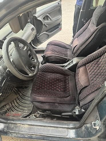 Mazda 626: 1995 г., 1.8 л, Механика, Бензин — 5