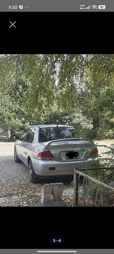 toyota corolla 2002: Mitsubishi Lancer: 2004 г., 1.6 л, Механика, Бензин, Седан — 5