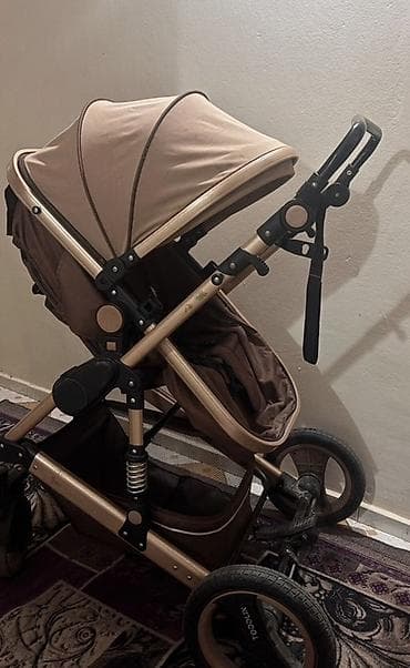 Детская коляска-трансформер 2-в-1 (люлька/прогулочный блок)