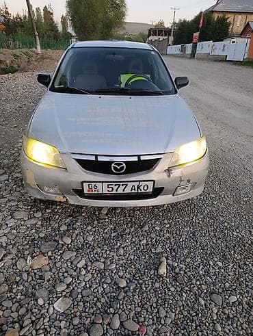 tyre master: Mazda 323: 2003 г., 1.3 л, Ручные, Бензин, Универсал — 2