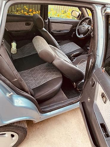 Унаа: Daewoo Nexia: 2010 г., 1.5 л, Кол менен иштөөчү, Бензин, Седан — 9