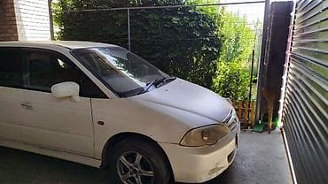 ио пинин: Honda Odyssey: 2000 г., Минивэн — 3