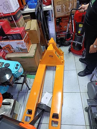 Рохли: Ручная гидравлическая тележка (рохля) грузоподъёмностью 2,5–3 т - — 1