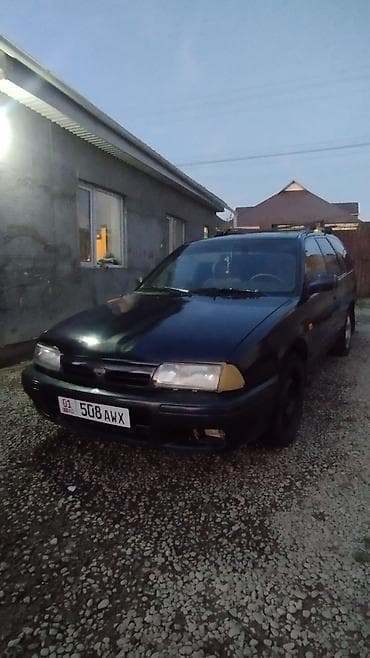 саната нюрас: Nissan Primera: 1996 г., 2 л, Механика, Бензин, Универсал — 2