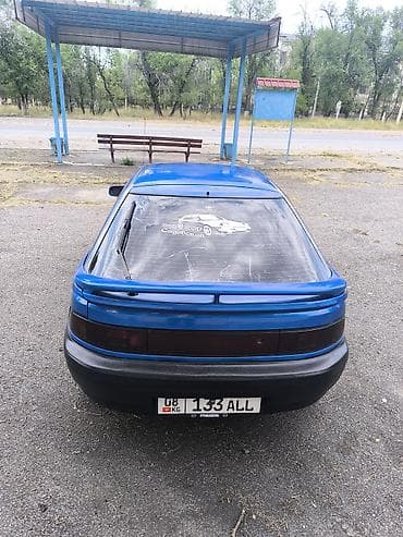 обмен на сапок: Mazda 323: 1994 г., 1.8 л, Механика, Бензин, Хэтчбэк — 6