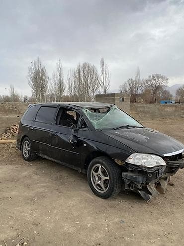 разбитые авто: Honda Odyssey (RA6/RA7) — черный минивэн, левый руль. Бензиновый — 2