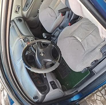 Nissan Almera: 2002 г., 1.8 л, Автомат, Бензин, Хетчбек — 10