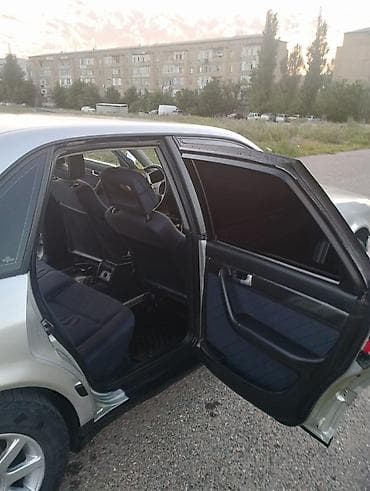 matiz diska: Audi 100: 1991 г., 2.3 л, Механика, Седан — 8