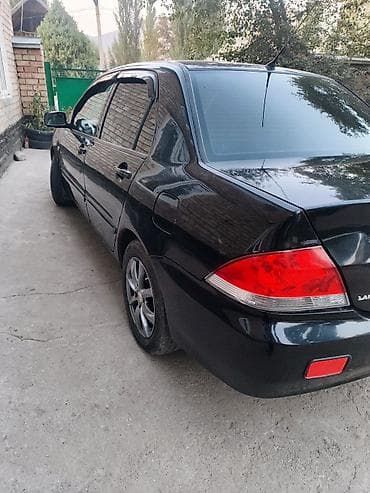 ветровики ниссан: Mitsubishi Lancer: 2007 г., 1.6 л, Автомат, Седан — 1