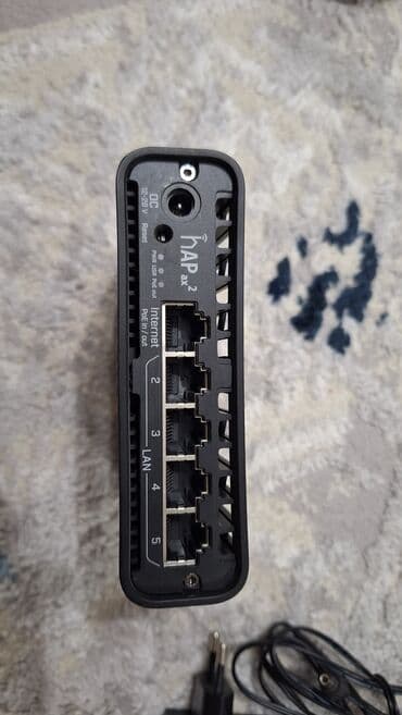 сетевые адаптеры mikrotik: Продам Микротик RouterBoard hAP ax2 (C52iG-5HaxD2HaxD-TC — 2