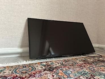 Техника и электроника: Телевизор LED, диагональ примерно 32–40". Тонкие рамки, плоская — 1