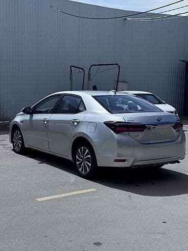 coroll: Toyota Corolla: 2019 г., 1.8 л, Автомат, Электромобиль, Седан — 5