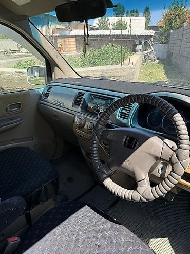 реалии: Honda Stepwgn: 2002 г., 2 л, Автомат, Газ — 8