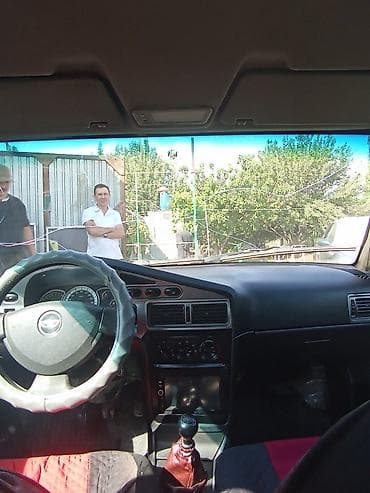 Продажа авто: Daewoo Nexia: 2012 г., Механика, Бензин, Седан — 5