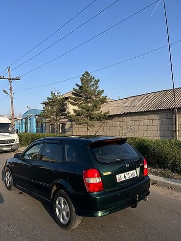 2 4 д: Mazda 323: 2000 г., 2 л, Механика, Бензин, Хэтчбэк — 4