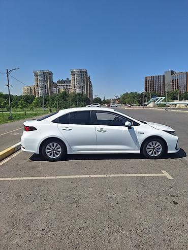 corolla 2004: Toyota Corolla: 2023 г., 1.8 л, Вариатор, Гибрид, Седан — 2