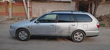 p11: Nissan Primera: 2000 г., 1.8 л, Механика, Бензин, Универсал — 7