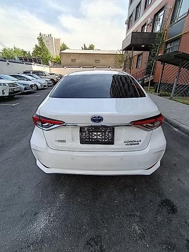 на corolla: Toyota Corolla: 2022 г., 1.8 л, Вариатор, Гибрид, Седан — 6